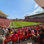 A soccer stadium is filled with excited fans